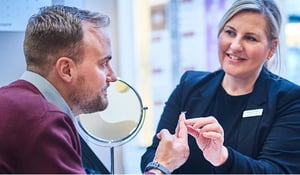 customer-and-store-assistant-trying-out-glasses-600x350px